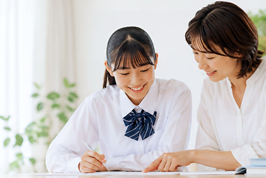 受験に向け準備をする親子のイメージ